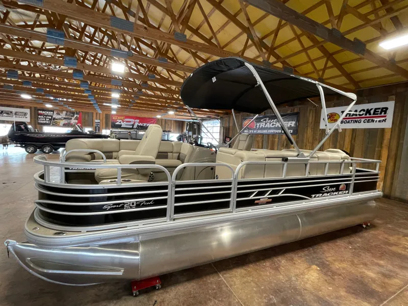 Slide: The Image of 2023 Sun Tracker SportFish 20 DLX pontoon boat in showroom. - 4