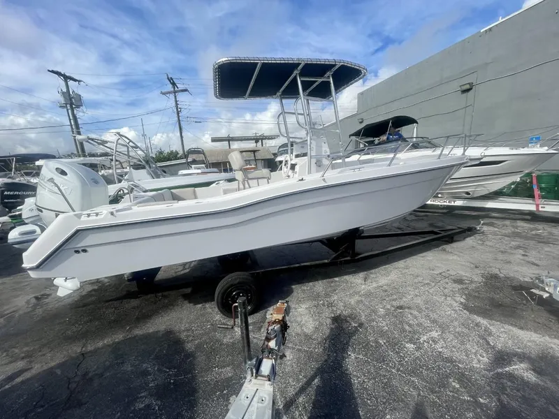Slide: The Image of 2022 Wellcraft 220CC center console boat on trailer. - 15