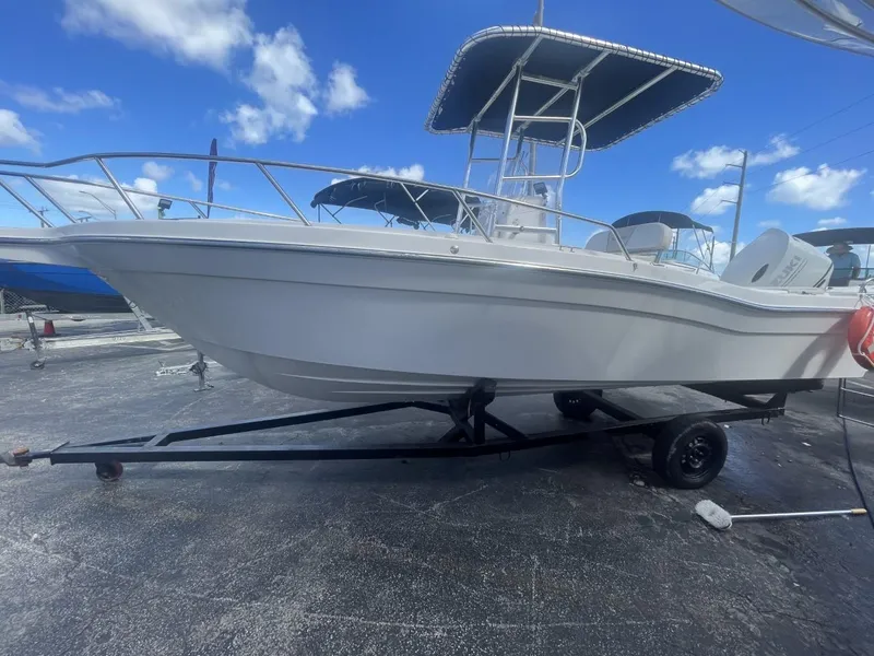 Slide: The Image of 2022 Wellcraft 220CC boat with a 175 horsepower engine. - 33