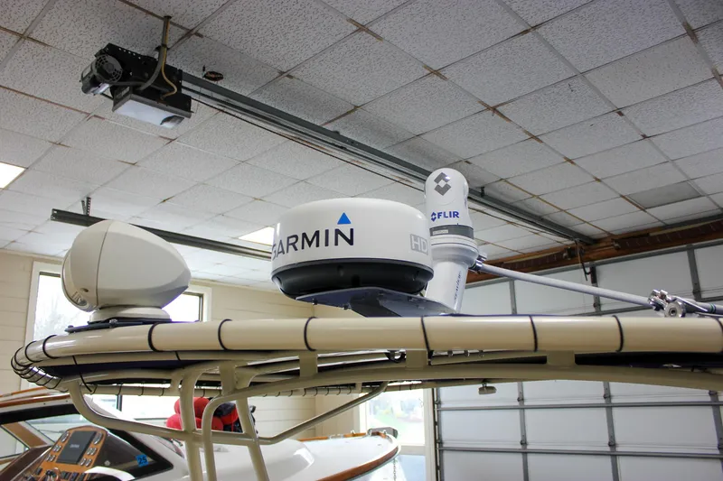 Slide: The Image of 2014 Chris-Craft Catalina 29 Sun Tender with Garmin and FLIR equipment in a garage. - 25