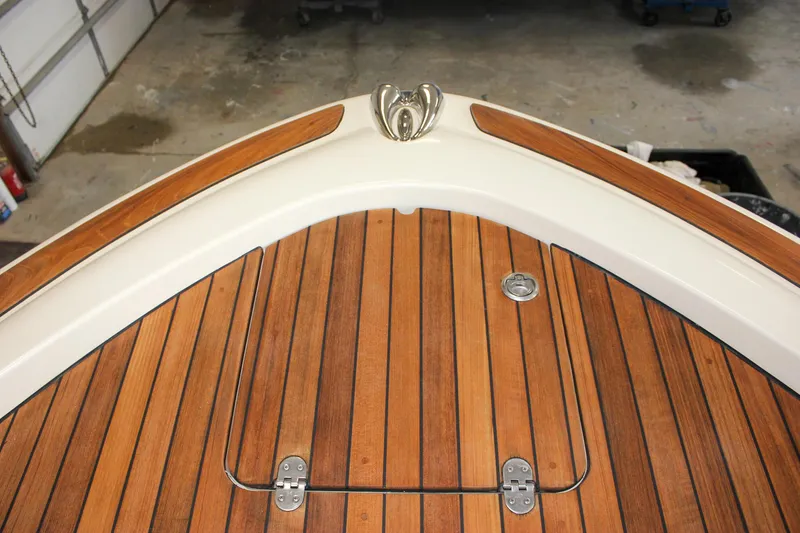 Slide: The Image of 2014 Chris-Craft Catalina 29 Sun Tender with elegant wooden deck detail. - 33
