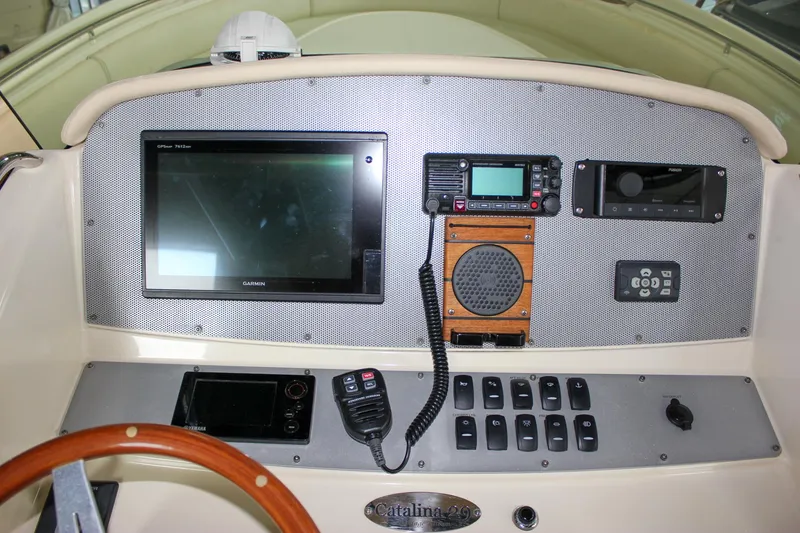 Slide: The Image of 2014 Chris-Craft Catalina 29 Sun Tender dashboard with navigation and communication equipment. - 4