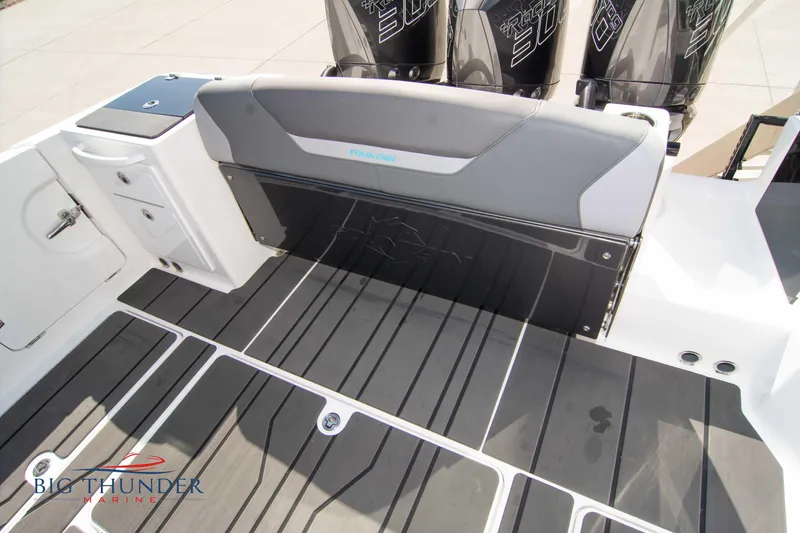 Slide: The Image of Rear view of Fountain 32 NX boat, model year 2022. - 14