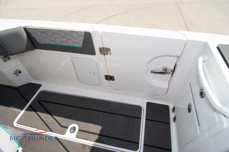 Slide: The Image of Interior of 2022 Fountain 32 NX with seating and storage area. - 17
