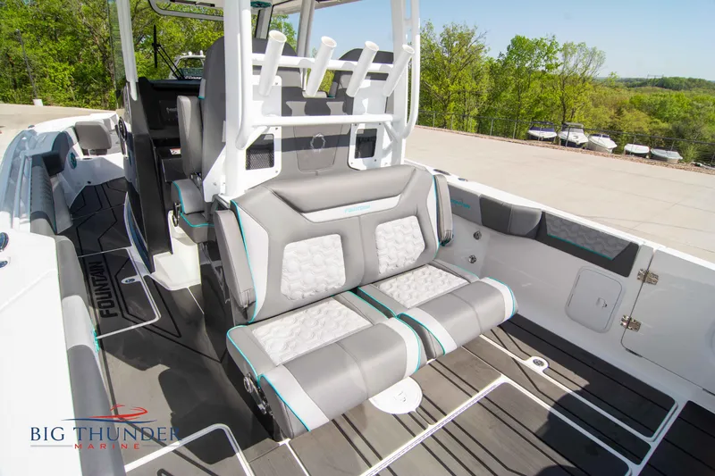 Slide: The Image of Interior of a 2022 Fountain 32 NX boat with luxurious seating. - 18