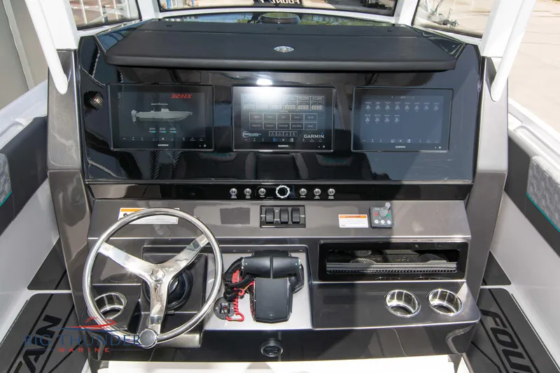 Slide: The Image of Dashboard of Fountain 32 NX boat, model year 2022. - 27