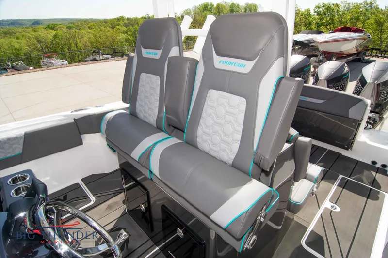 Slide: The Image of Interior of 2022 Fountain 32 NX with gray seating. - 39