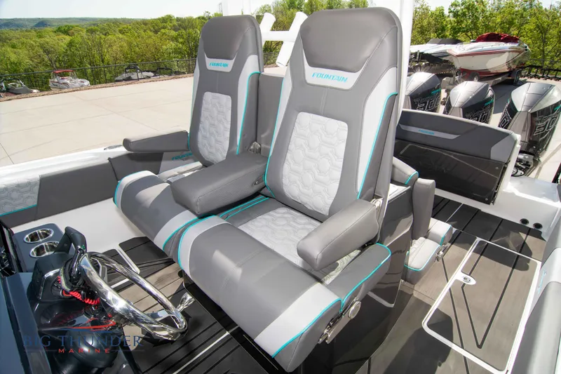 Slide: The Image of Fountain 32 NX 2022 boat seats and helm area. - 40