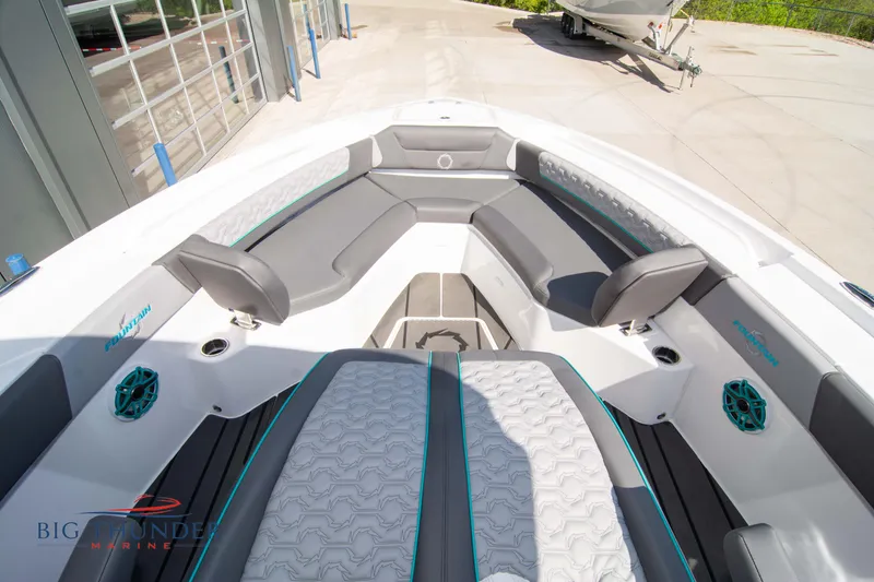 Slide: The Image of Interior view of 2022 Fountain 32 NX boat with gray and white seating. - 45