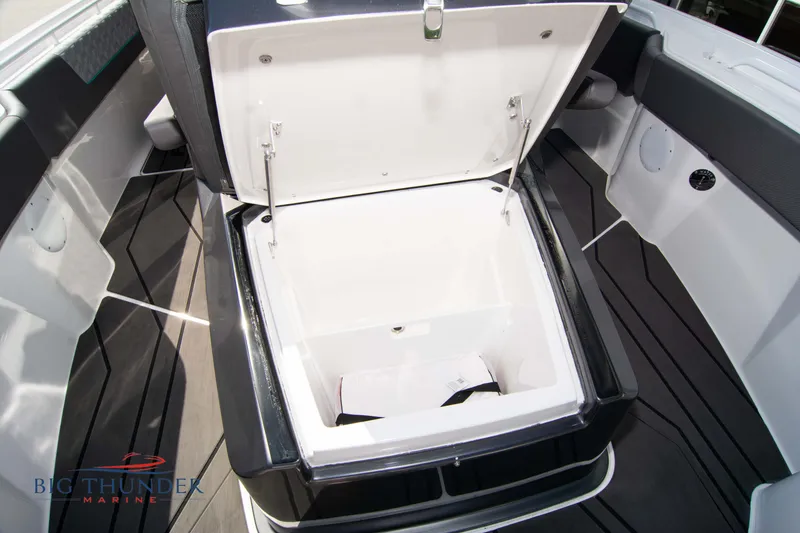 Slide: The Image of Open storage compartment in Fountain 32 NX boat, 2022 model. - 49