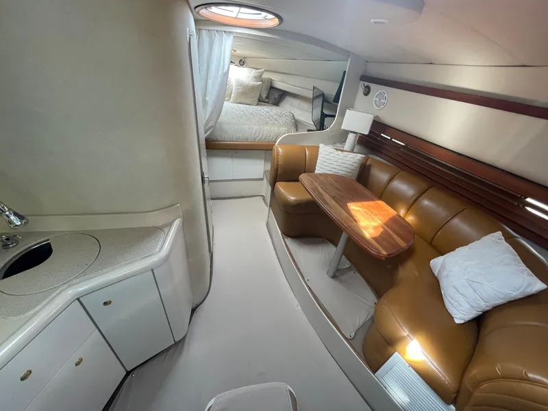 Slide: The Image of Luxurious interior of 1998 Cruisers Yachts 3375 Esprit with cozy seating and elegant design. - 22