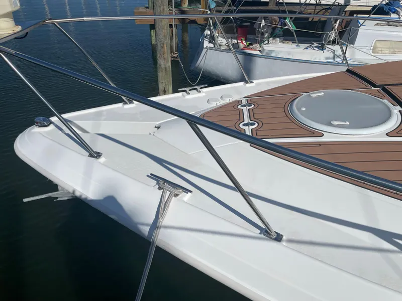 Slide: The Image of 1998 Cruisers Yachts 3375 Esprit boat deck with railing and hatch. - 5