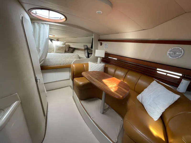 Slide: The Image of Luxurious interior of 1998 Cruisers Yachts 3375 Esprit with cozy seating and elegant design. - 23