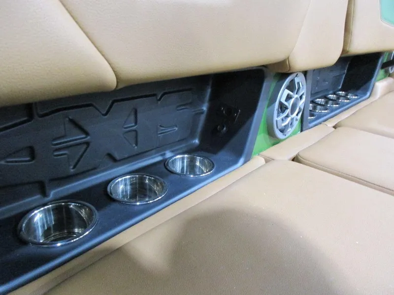 Slide: The Image of 2023 Axis A24 boat interior with cup holders and speaker. - 6