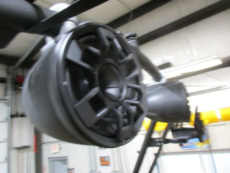 Slide: The Image of Close-up of a speaker on a 2023 Axis A24 boat in a garage. - 7