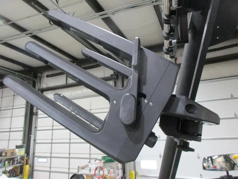 Slide: The Image of 2023 Axis A24 boat wakeboard rack in a garage. - 16