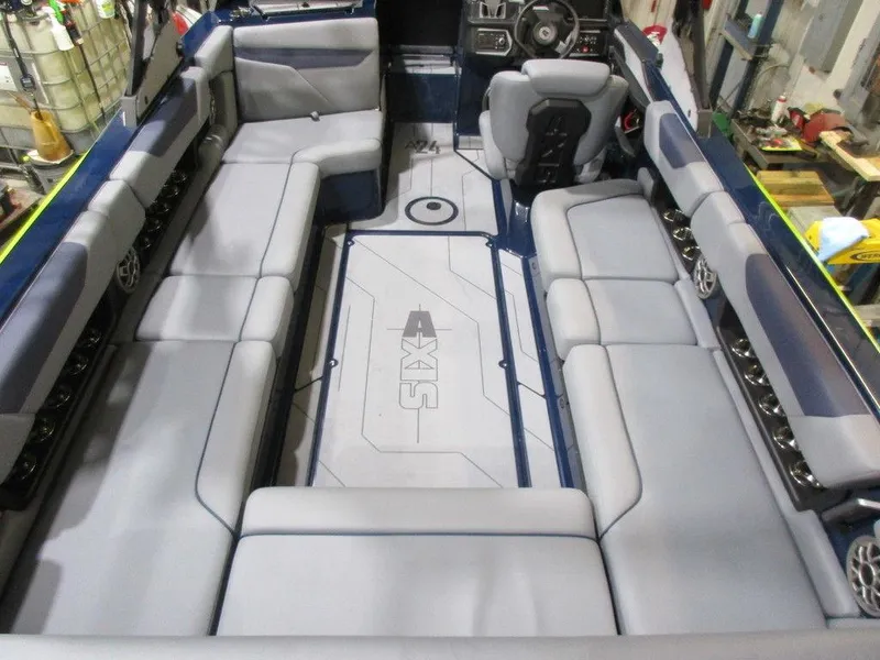 Slide: The Image of 2023 Axis A24 boat interior with spacious seating and modern design. - 3