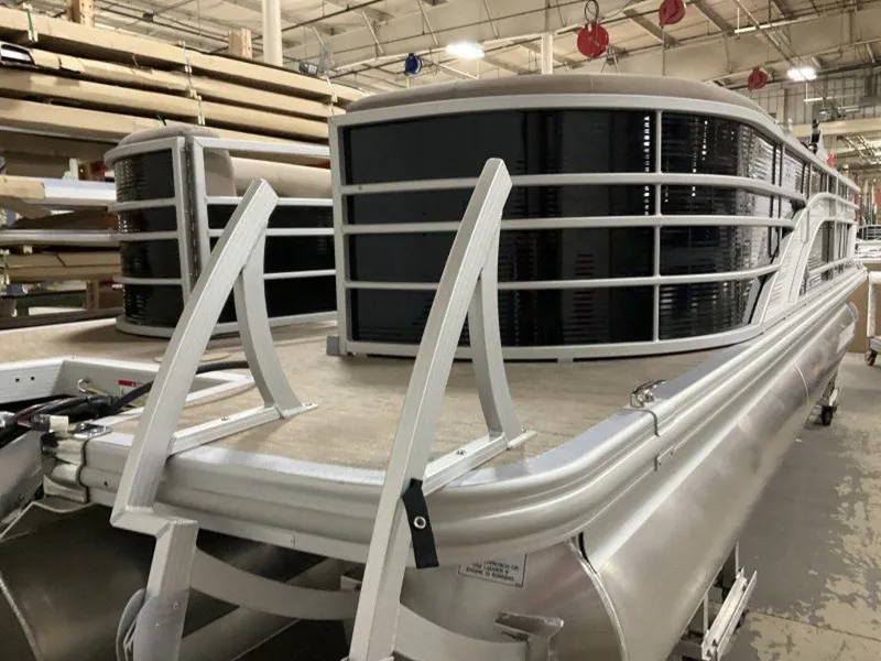 Slide: The Image of 2023 Bennington 23 LSR pontoon boat in a manufacturing facility. - 15