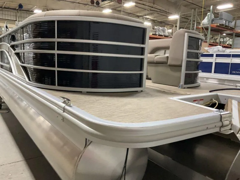 Slide: The Image of 2023 Bennington 23 LSR pontoon boat in a warehouse. - 16
