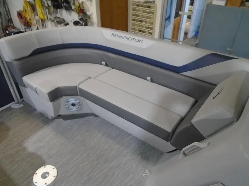 Slide: The Image of 2023 Bennington 23 SXSR boat interior with gray and blue seating - 19