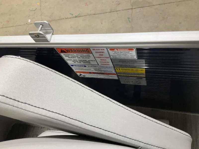 Slide: The Image of 2023 Bennington 23 SXSR boat warning labels and seat detail. - 20