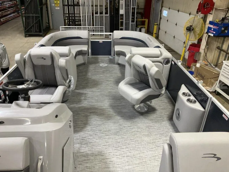 Slide: The Image of 2023 Bennington 23 SXSR pontoon boat interior with gray seating and modern design. - 3