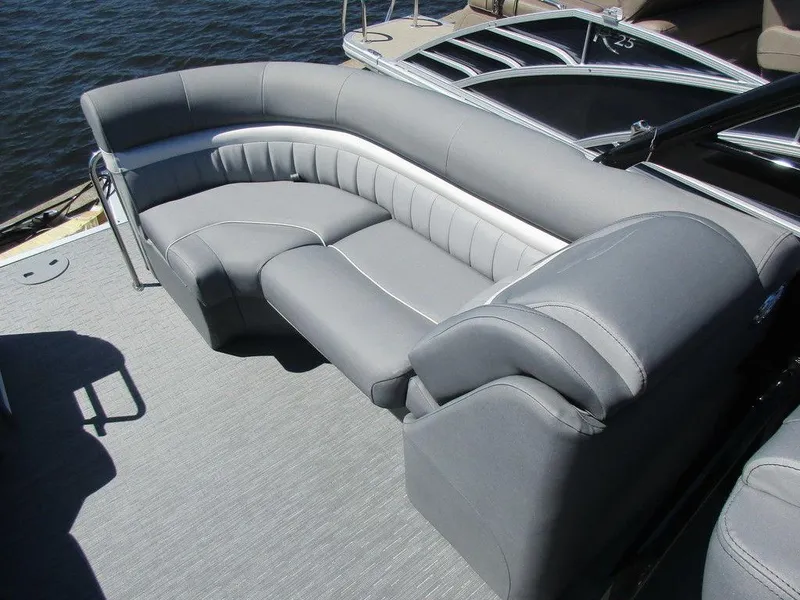 Slide: The Image of 2023 Bennington 24 LXFBA boat with luxurious gray seating. - 12