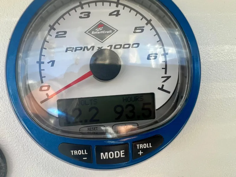 Slide: The Image of 2016 Renegade 250 SmartCraft RPM gauge showing 93.5 hours and 12.2 volts. - 8