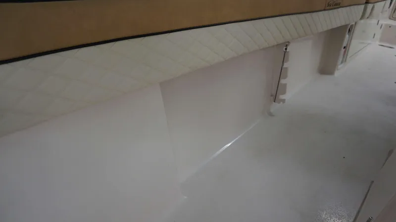 Slide: The Image of Interior view of 2023 Sea Chaser 27 HFC boat with quilted upholstery. - 10