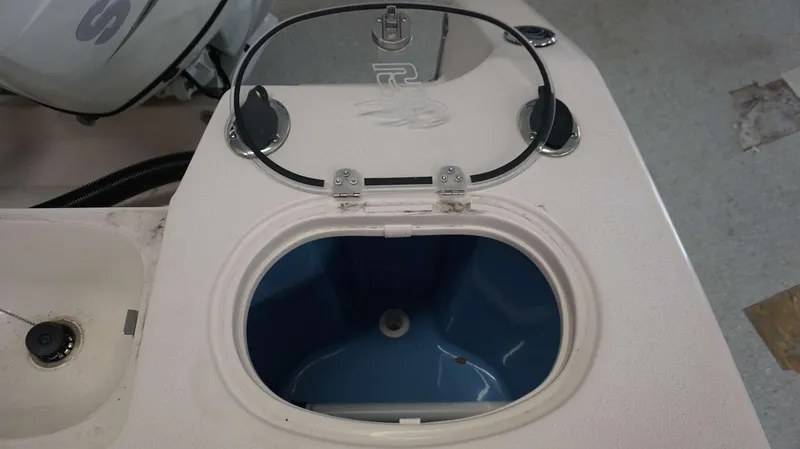 Slide: The Image of Livewell compartment on a 2023 Sea Chaser 27 HFC boat. - 26