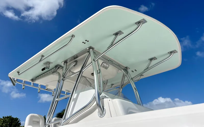 Slide: The Image of 2009 Spectre Sportfish boat T-top against blue sky. - 15