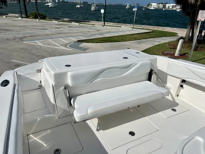 Slide: The Image of 2009 Spectre Sportfish boat with white seating and ocean view. - 24