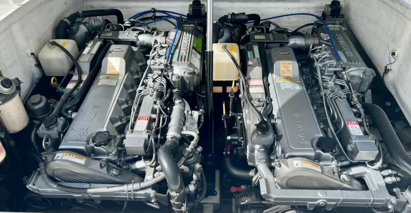 Slide: The Image of Twin engines of a 2009 Spectre Sportfish boat. - 26