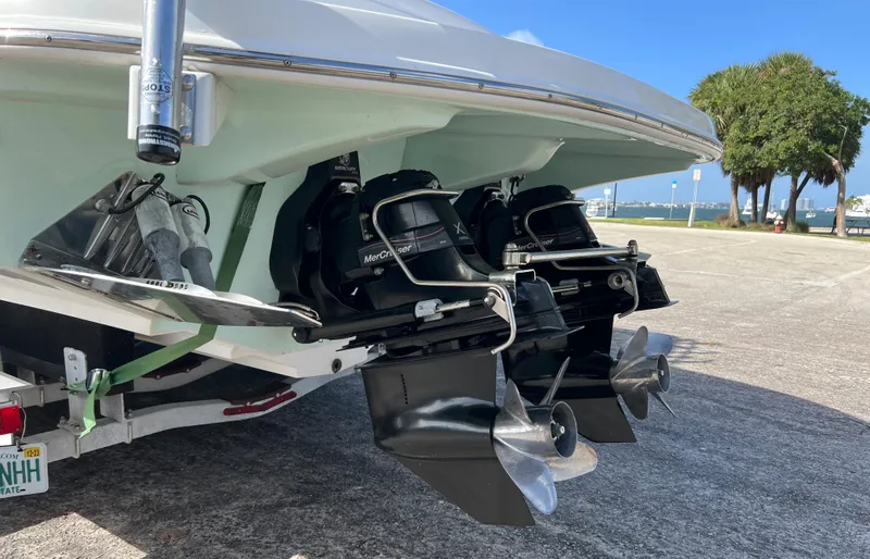 Slide: The Image of 2009 Spectre Sportfish boat with dual Mercury outboard engines on a trailer. - 35