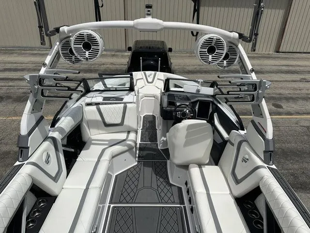 Slide: The Image of Interior view of 2021 Tigé 25ZX boat with luxurious features. - 11
