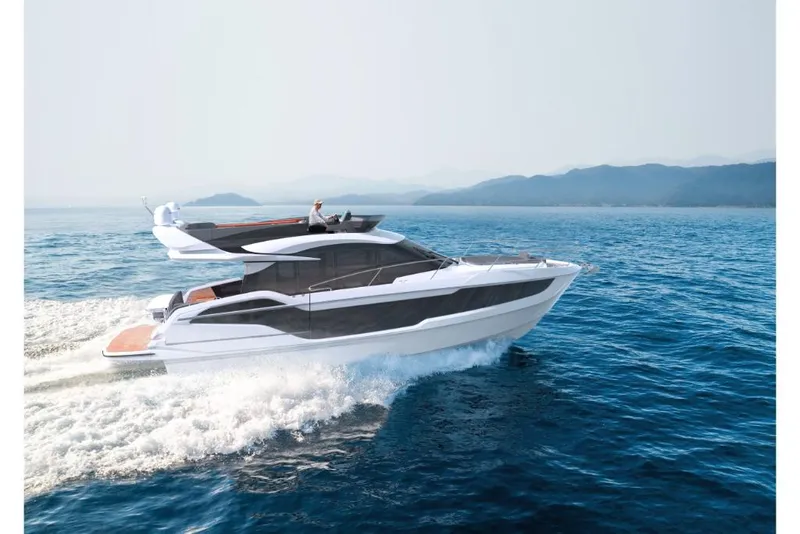 Slide: The Image of 2023 Galeon 440 Fly yacht cruising on open water. - 3