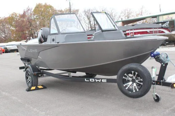 Slide: The Image of 2023 Lowe Fishing Machine 162 on trailer, ready for outdoor adventures. - 1