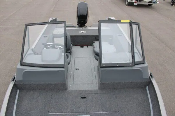 Slide: The Image of 2023 Lowe Fishing Machine 162 boat interior with open windshield. - 15
