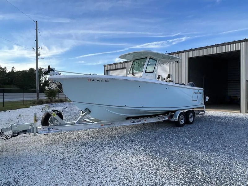 The Image of 2022 Sailfish 272 CC boat on a trailer outside a storage facility. - 1