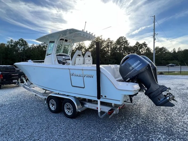 Slide: The Image of 2022 Sailfish 272 CC boat on a trailer with Yamaha outboard motor. - 23
