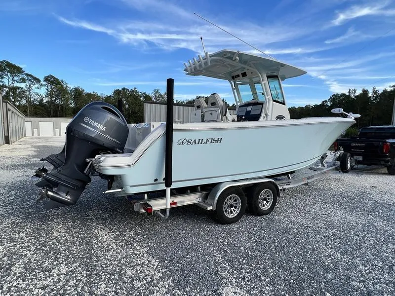 Slide: The Image of 2022 Sailfish 272 CC boat on a trailer with Yamaha outboard motor. - 3