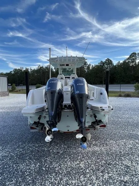 Slide: The Image of 2022 Sailfish 272 CC boat with twin outboard engines, rear view. - 5