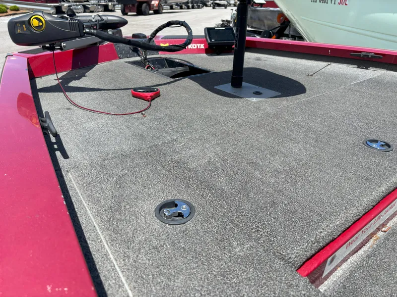 Slide: The Image of 2018 G3 Sportsman 1710 boat deck with trolling motor and control panel. - 12