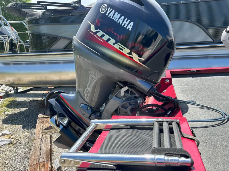 Slide: The Image of 2018 G3 Sportsman 1710 with Yamaha VMAX outboard motor on a trailer. - 16