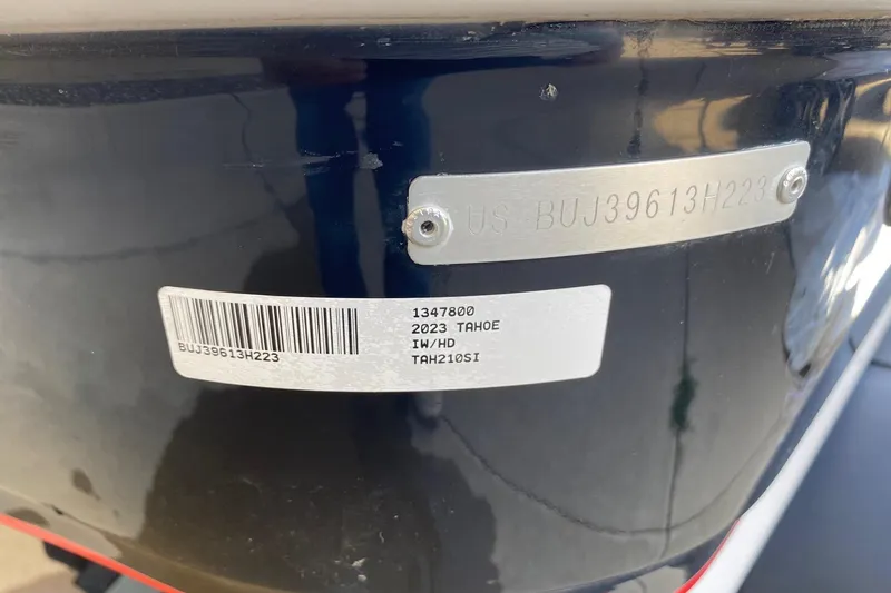 Slide: The Image of 2023 Tahoe 210 Si Limited boat identification plate with serial number and barcode. - 12