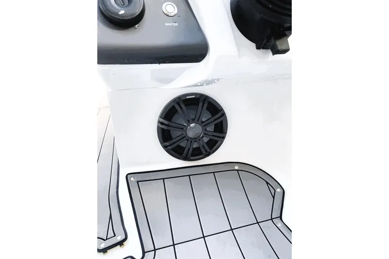 Slide: The Image of 2023 Tahoe 210 Si Limited boat interior with speaker and control panel. - 7