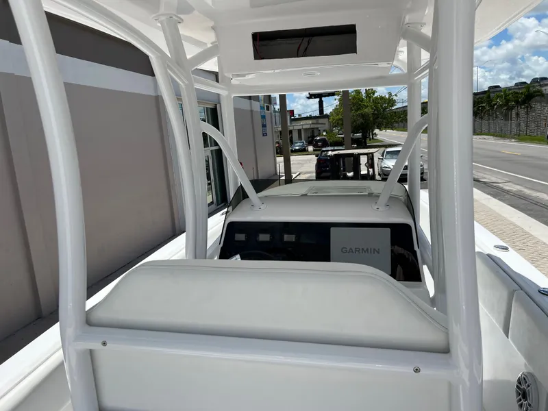 Slide: The Image of 1979 Wellcraft Scarab Sport 302 boat interior with Garmin navigation system. - 15