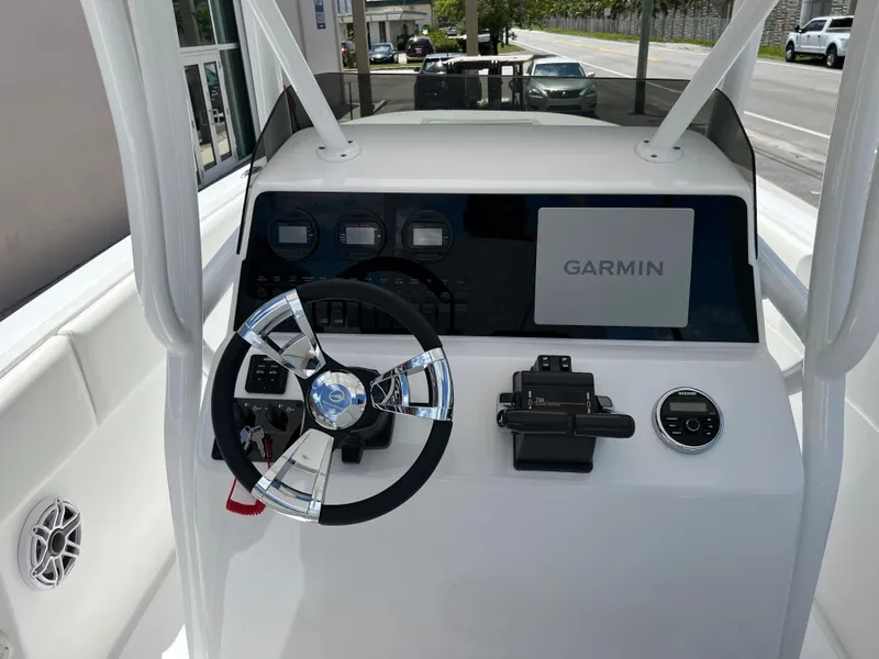 Slide: The Image of 1979 Wellcraft Scarab Sport 302 boat dashboard with Garmin navigation system. - 18