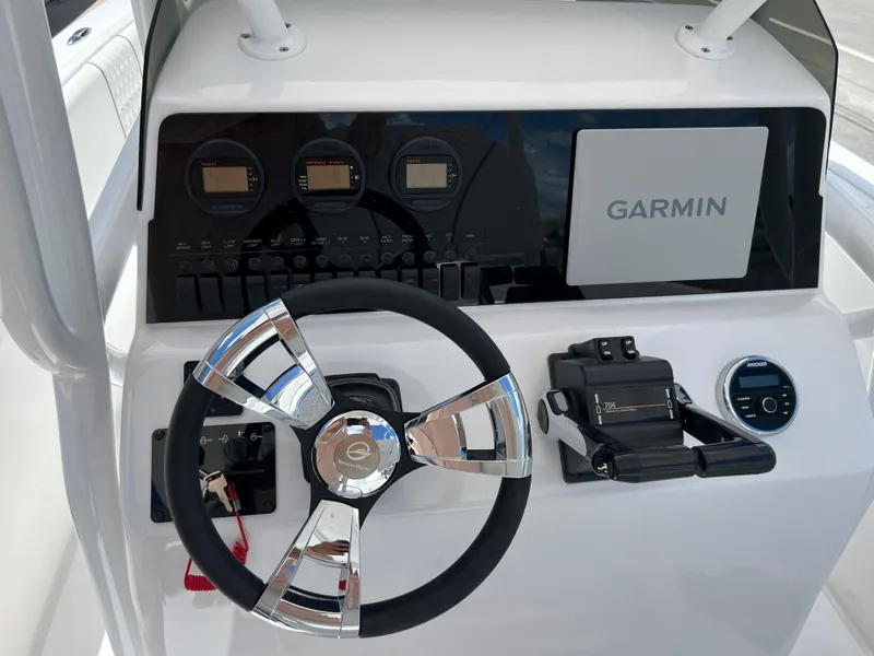 Slide: The Image of 1979 Wellcraft Scarab Sport 302 boat dashboard with Garmin navigation system. - 19