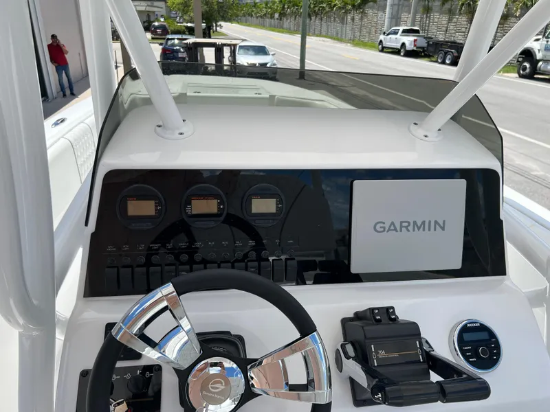 Slide: The Image of 1979 Wellcraft Scarab Sport 302 boat dashboard with Garmin navigation system. - 20